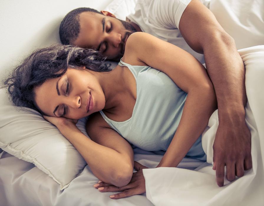  couple resting after sleep apnea treatment in Champaign