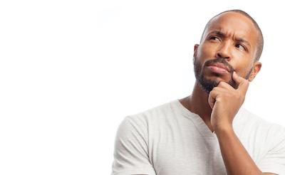 Man looking up in a thinking pose