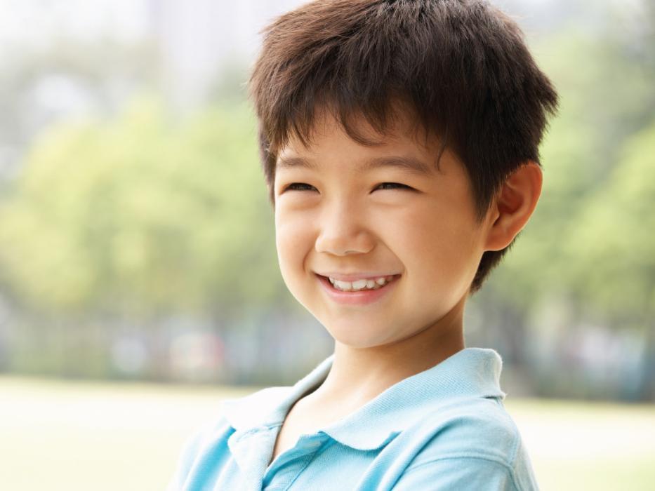 Pediatric dental patient smiling near Champaign IL