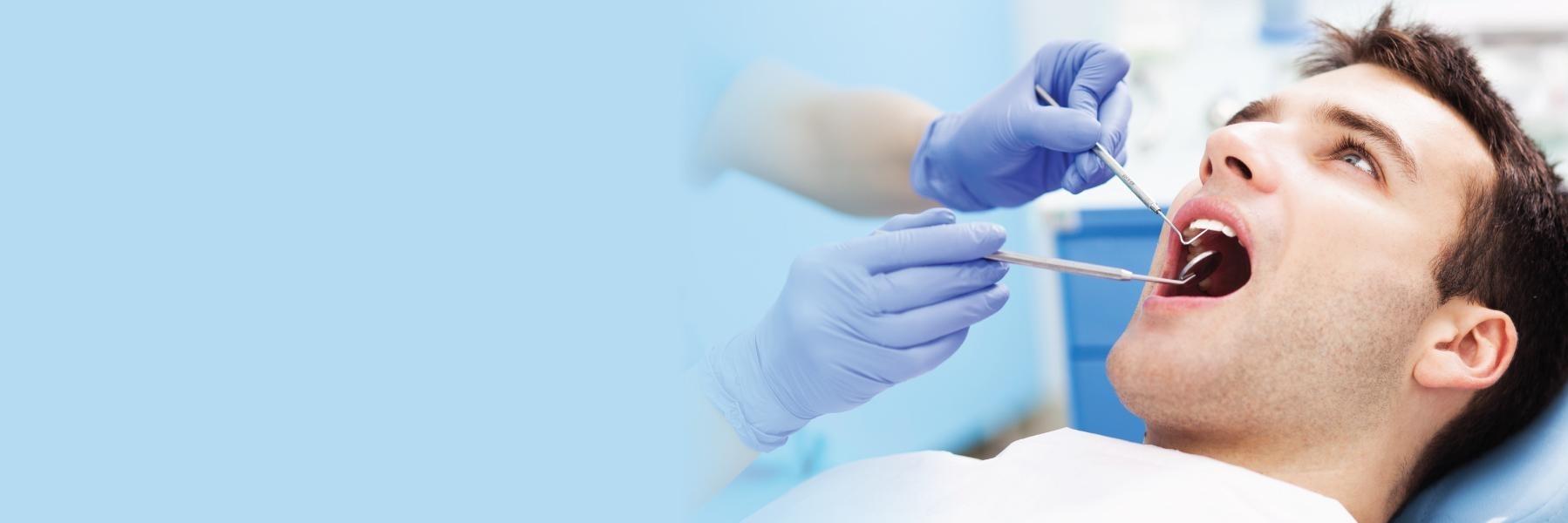 Patient using nitrous oxide at dentist in Champaign IL