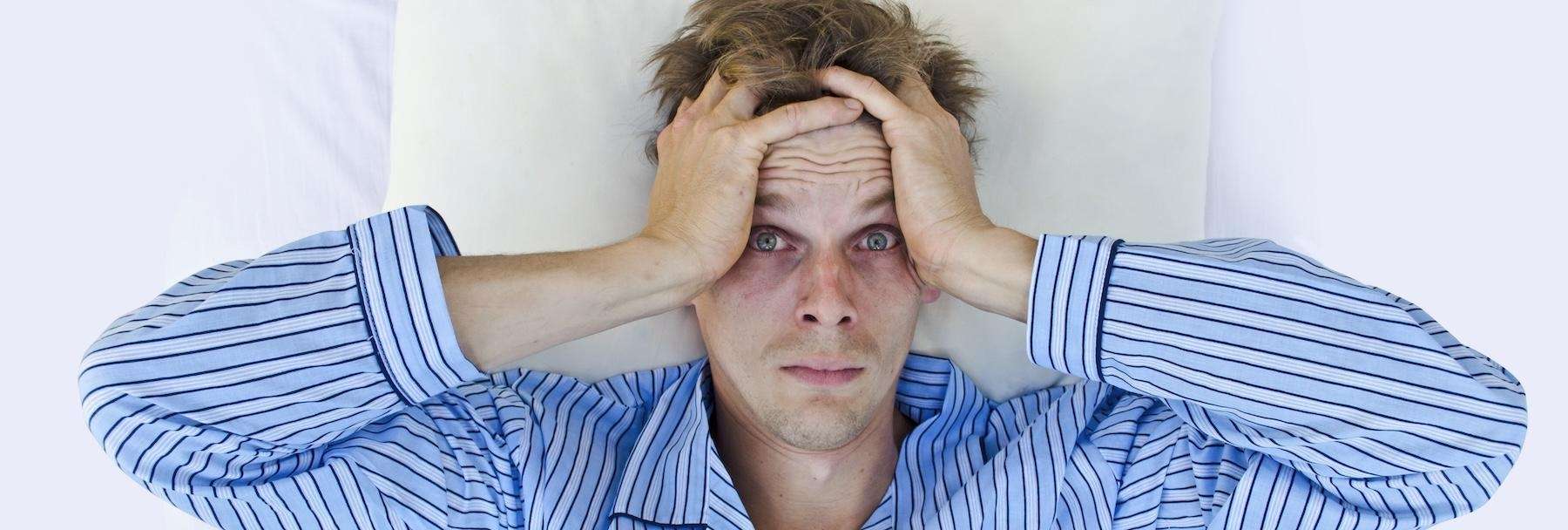 man who was awoken from his snoring that is due to sleep apnea