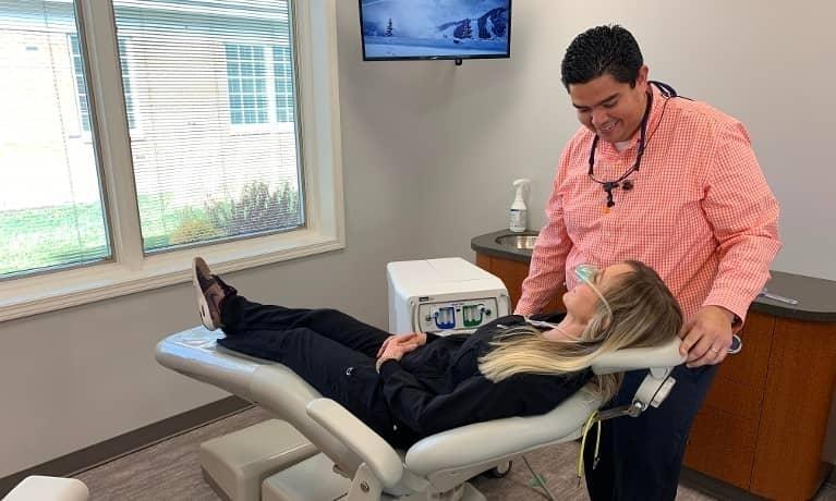 Patient Room Dr. Cesar Alburez during a dental implants consultation in Champaign, IL
